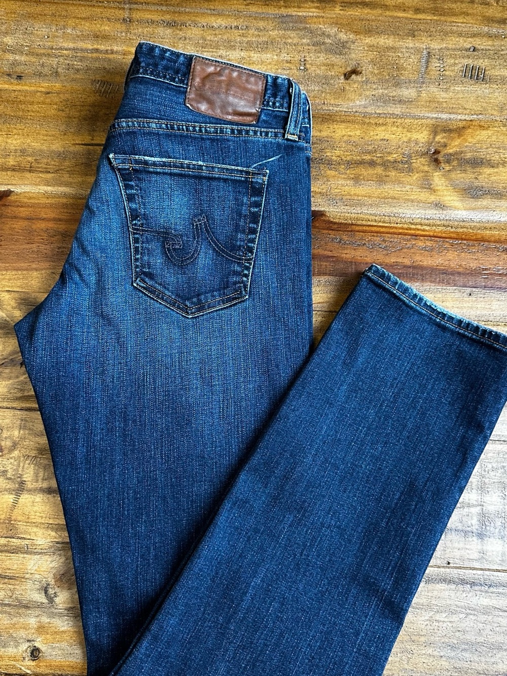 AG Adriano Goldschmied Slim Straight Jeans in Deep Blue with Brown Patch